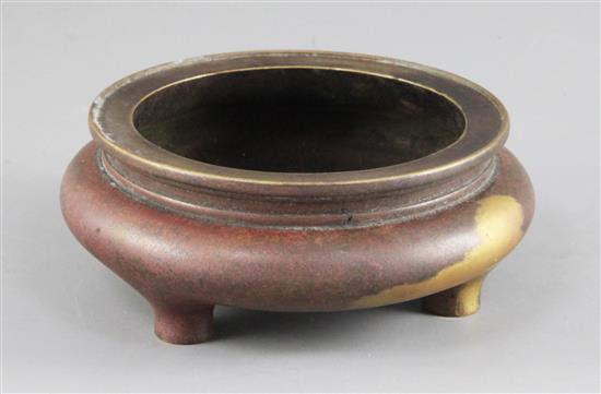A Chinese gilt splashed bronze tripod censer, Ding, diameter 13cm